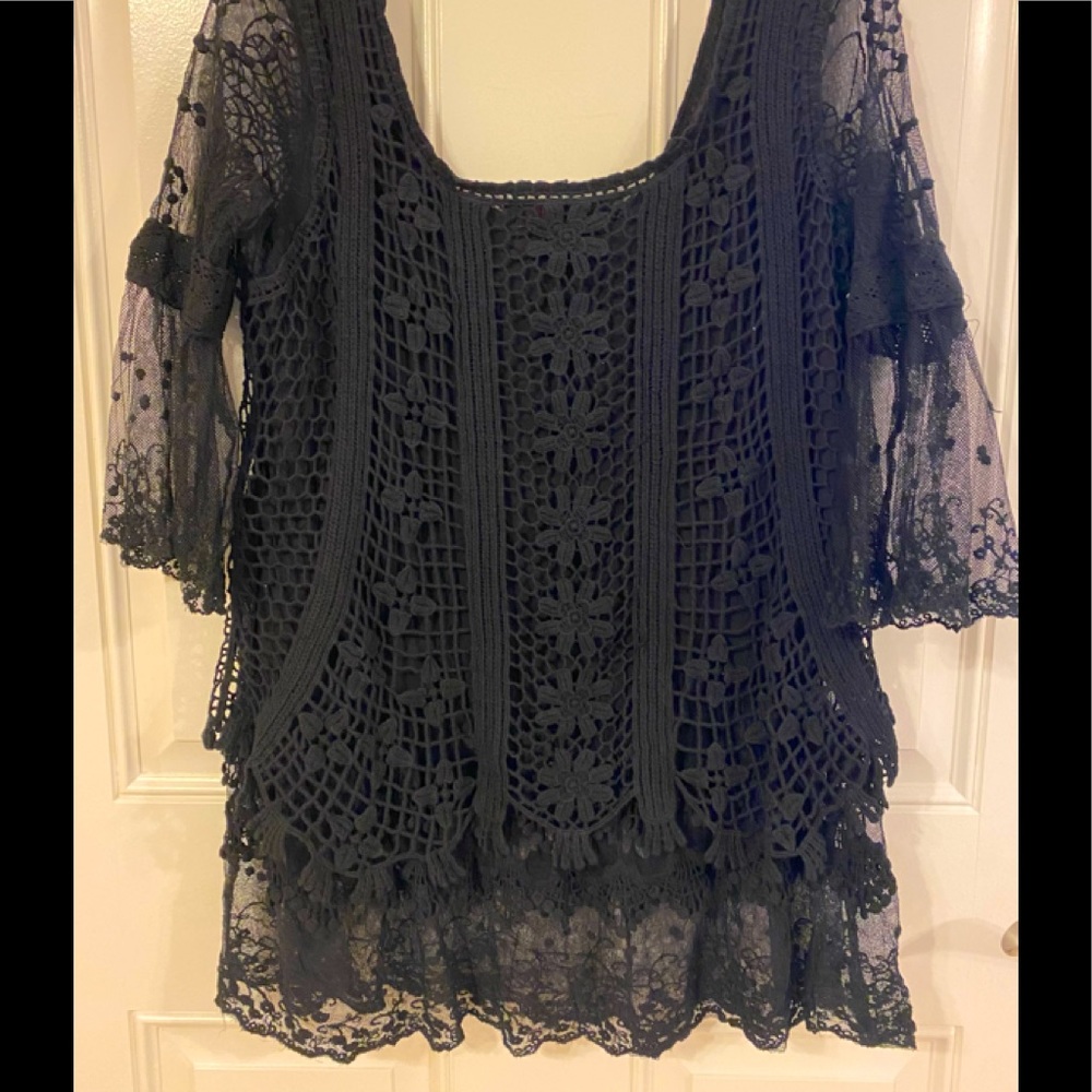 Gorgeous black crochet look blouse.